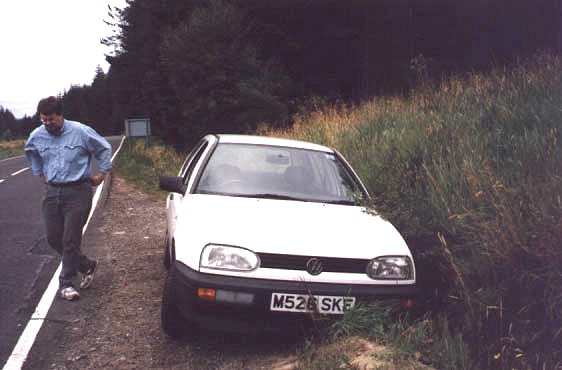 a non-clickable picture of our car stuck in a ditch